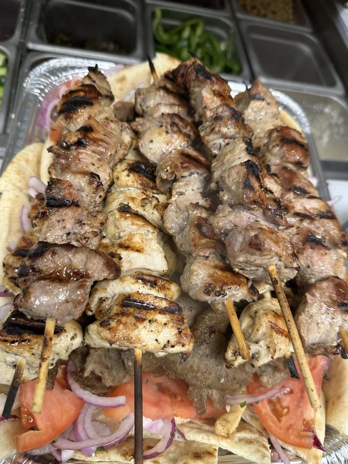 Grilled souvlaki catering tray prepared by The Greek in Mooresville